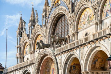 Architectural detail with the facade of Saint Marks Basilica in Venice, Italy.,
