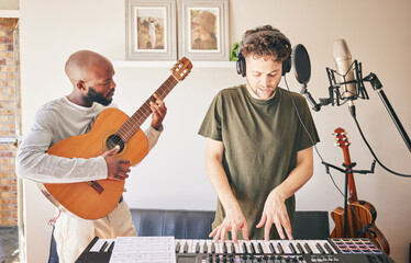 Music, piano and friends with guitar recording in home studio together. Electric keyboard,...