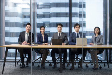 Confident Chinese business people having a meeting