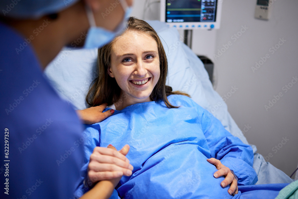 Wall mural pregnant woman, labor and hospital with holding hands, bed and support from nurse, excited smile and