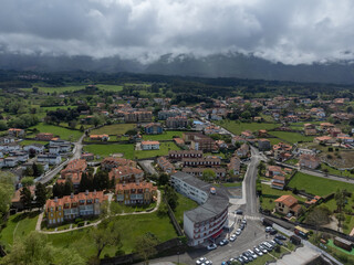 Vacation on Green coast of Asturias, aerial views of Celorio village with sandy beaches, North of Spain