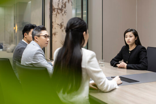 Confident Chinese businesswoman attending job interview