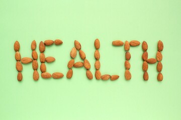 Almond nuts arranging in to a word 