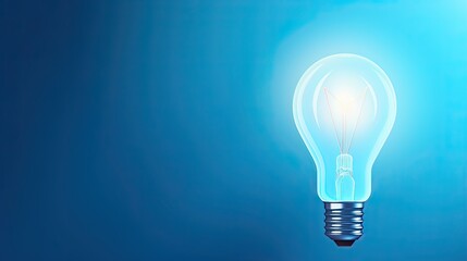 Light bulb on illuminating a blue background