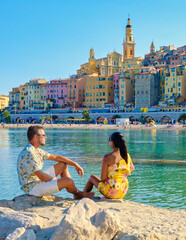 Menton France, men and woman on vacation at the Cote d Azur France, View on the old part of Menton,...