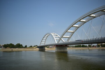 Fototapeta na wymiar ˝Novi Sad, Serbia - 07 11 2023: Žeželj Bridge and Danube river on a sunny day˝