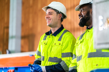 Professional team labor machanic engineer technician worker industrial work control with machine, manufacturing, factory, production line, Indusry 4.0, robot, industrial facility.business planning