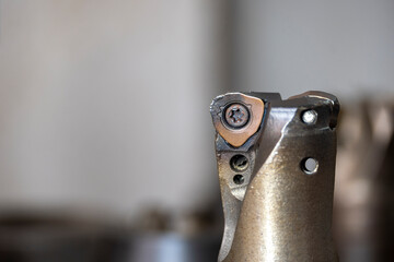 The wear of the cutting tool from milling process on machining center.