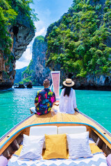 Luxury Longtail boat in Krabi Thailand, couple man, and woman on a trip to the tropical island 4...