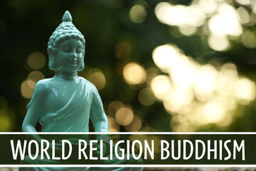 Decorative Buddha statue and text World Religion Buddhism on blurred background
