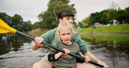 Child, mother and rowing kayak in lake on holiday, vacation and travel together. Mom, girl and kid in canoe, boat and bonding in river, water and fitness exercise on adventure with family outdoor.
