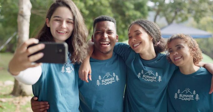 Camping, selfie and friends hug for photo in nature, bonding and having fun outdoors together. Smartphone, smile and gen z group of people students in a forest for hiking, adventure and holiday