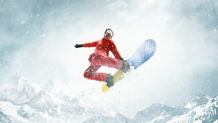In motion. Flying high. Sportive man riding snowboard over snowy mountains background. Warm sunny day. Concept of winter sport, action, motion, hobby, leisure time. Banner. Copy space for ad