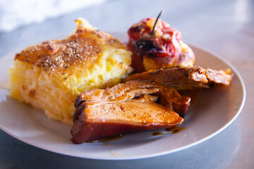 Trio Arequipeño. Stuffed rocoto, potato cake and pork rinds. Typical dish of the city of Arequipa.