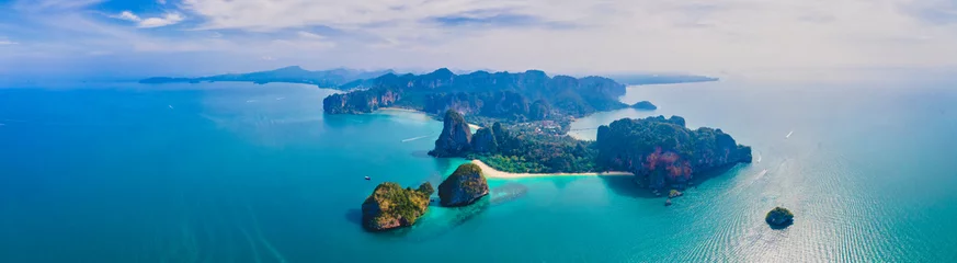 Papier Peint photo autocollant Railay Beach, Krabi, Thaïlande Railay Beach Krabi Thailand, the tropical beach of Railay Krabi, view from a drone of idyllic Railay Beach in Thailand in the evening at susnet with a cloudy sky