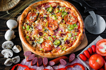 pizza and components lie side by side on the board