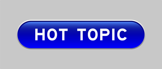 Blue color capsule shape button with word hot topic on gray background