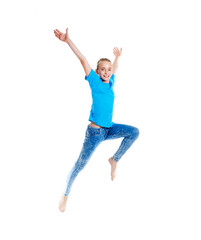 Young Girl with Blond Hair Jumping in the Air