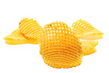Potato chips lattice pile isolated on white, side view