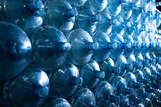 Plastic bottles of mineral water in a row, close-up