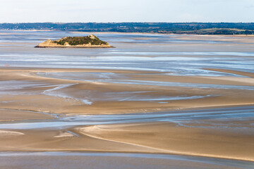 Sea coast at low tide, view from the top of the mount Saint Michael's, France - Powered by Adobe
