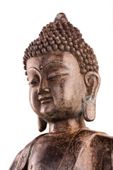 Buddha Shakyamuni's figure in a manual pose - vitarka mudra. The old statue made of metal isolated on a white background.