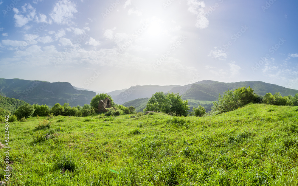 Sticker beautiful landscape with green mountains and magnificent cloudy sky. exploring armenia