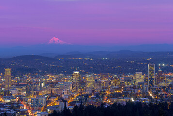 Downtown Portland Oregon Cityscape with Mount Hood during evening time after sunset