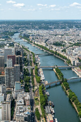 Beautiful city view of the Seine River from the top of the Eiffel Tower in Paris, France