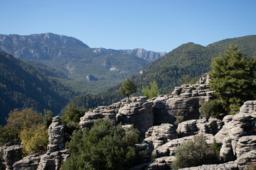 Extraordinary nature , old ruins of stones, mountains, forests, roads. Beautiful places for tourists. The beauty of the perennial nature.