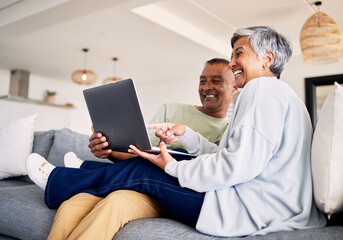 Mature couple, laptop and relax on sofa in living room, download media and choice of watching movie together. Happy man, woman and computer for streaming online video, web subscription and internet