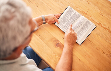 Naklejka premium Above, reading book or old man with holy bible for worship, support or hope in Christianity faith in retirement. Jesus, God or senior person studying or learning gospel prayer in spiritual religion