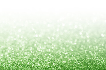 Obraz premium Abstract glitter green background with white copy space