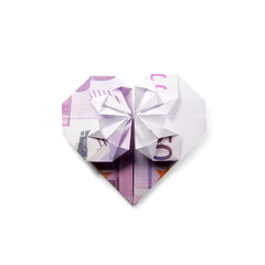 origami heart of banknotes on a white background