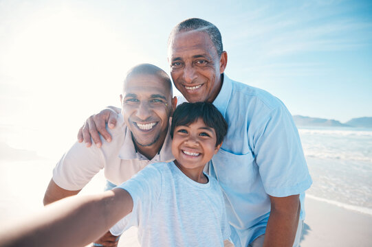 Grandfather, beach and selfie of father and boy on holiday, weekend and vacation in nature. Happy family, travel and portrait of grandpa, dad and child relax by sea for bonding, quality time and fun