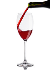 Pouring red wine from bottle to glass on white background