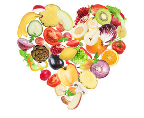 Vegetable and fruit forming a heart. Healthy food for wellness concept