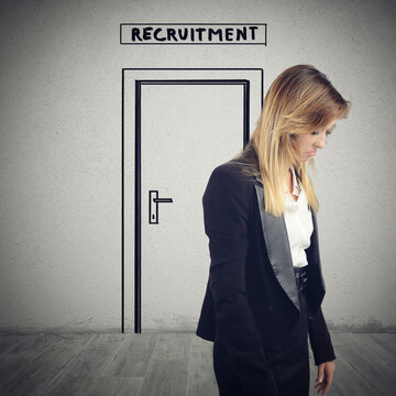 Woman exits from the room of recruitment sorrowfully because she is not hired