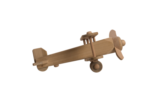 Isolated wooden airplane toy ready to fly