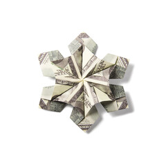 snowflake origami made of banknotes on a white background. Handmade