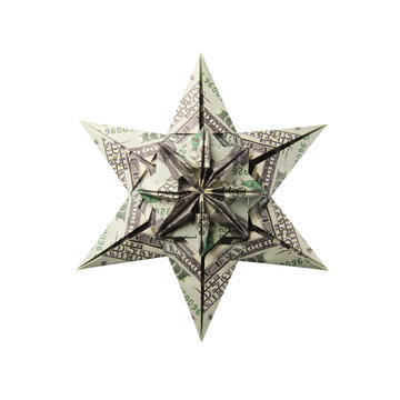 snowflake origami made of banknotes on a white background. Handmade