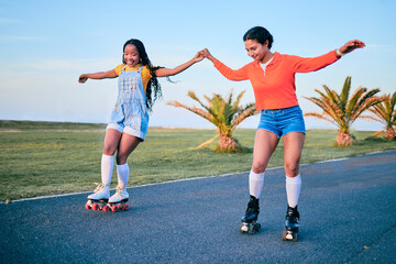 Holding hands, roller skates and friends on street for exercise, workout or training outdoor. Skating, happy people and girls together for sports on road to travel, journey and moving for fitness.