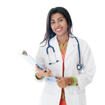 Portrait of Indian female doctor in uniform hand holding medical test report, standing isolated on white background.