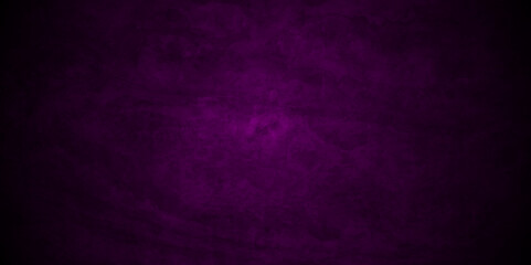 Dark black and purple background with grunge backdrop texture, watercolor painted mottled purple background, colorful bright ink and watercolor textures on black paper background.