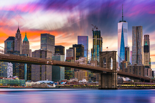 New York City skyline with the Brooklyn Bridge and Financial district on the East River.