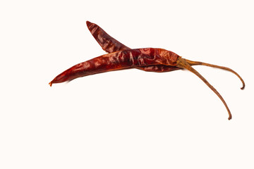 Bright Red dried red chillies are display on white background