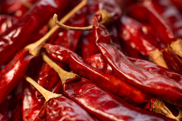 Bright Red dried red chillies are display on white background