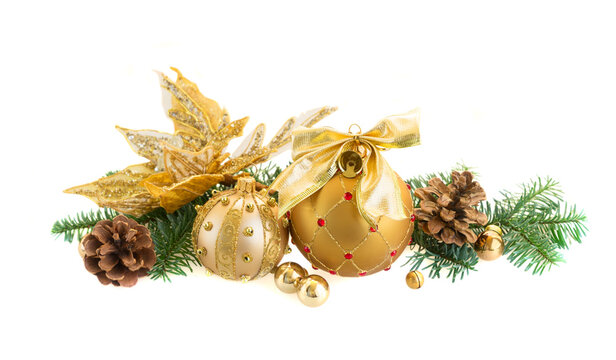 Christmas golden balls and evergreen twigs isolated on white background
