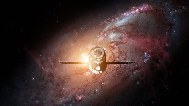 Spacecraft Progress orbiting the earth. Elements of this image furnished by NASA.