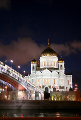 Fototapeta na wymiar Night landscape the bridge through the Moskva River and the Cathedral of Christ the Saviour in the city of Moscow